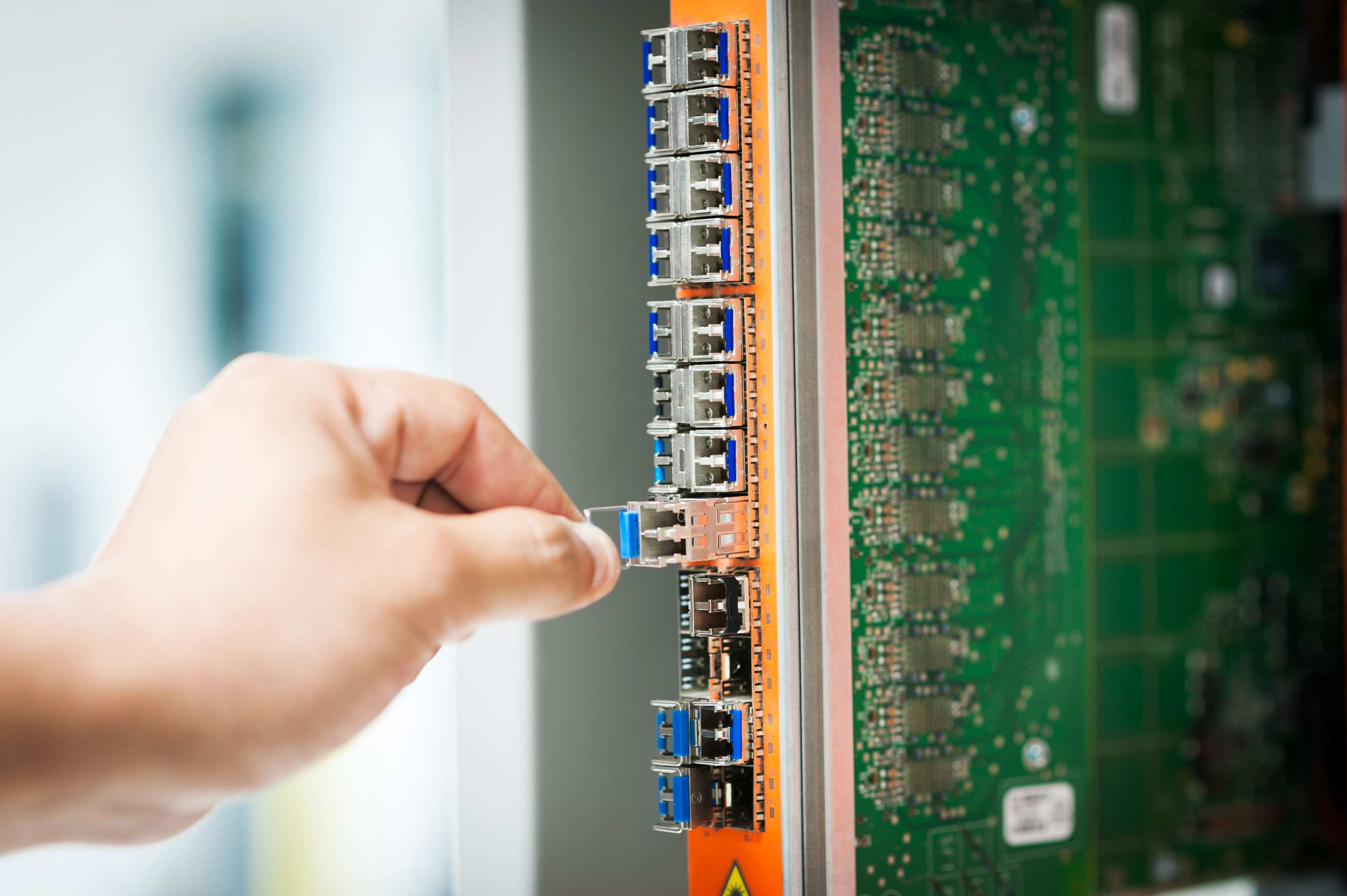 Server rack with network cables in a data room — datacenter switch cabinet